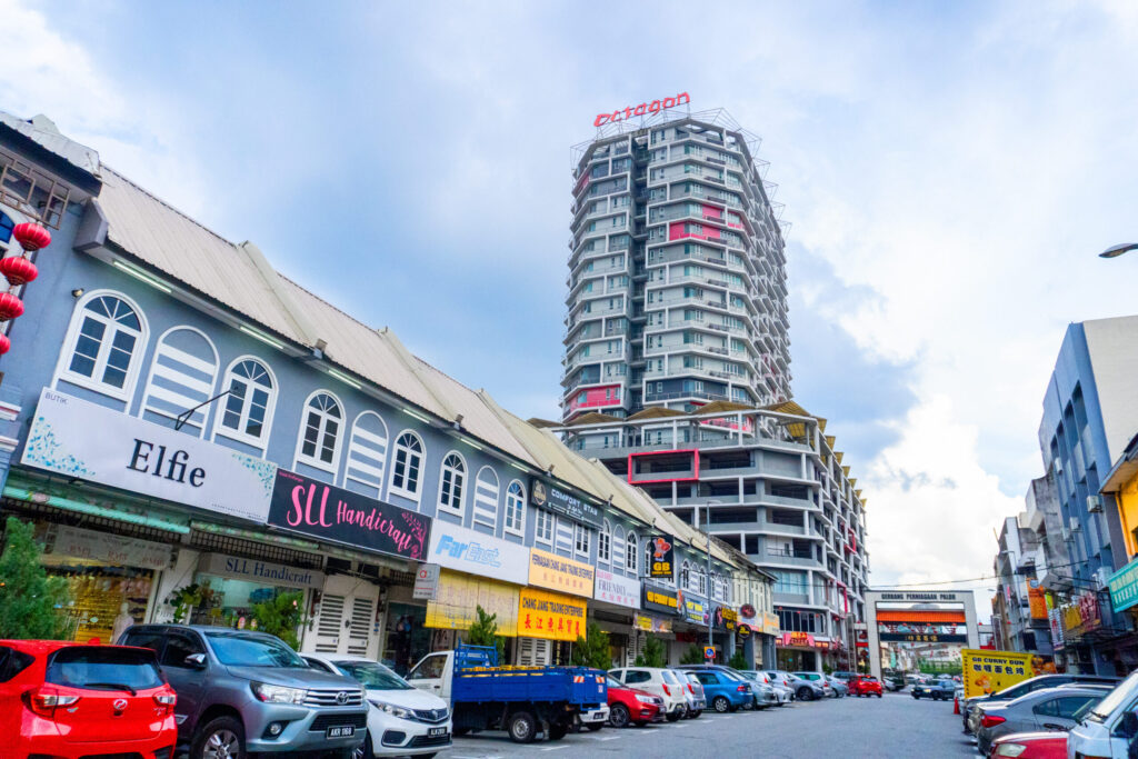 Wide view of Ipoh city in Malaysia, showing buildings, roads and local urban surroundings.