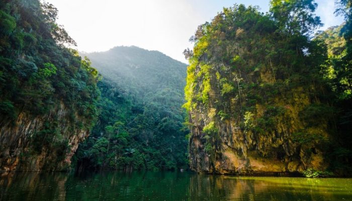 Ipoh Mirror Lake in Malaysia, showcasing peaceful natural scenery and limestone hills suitable for MM2H lifestyle content.